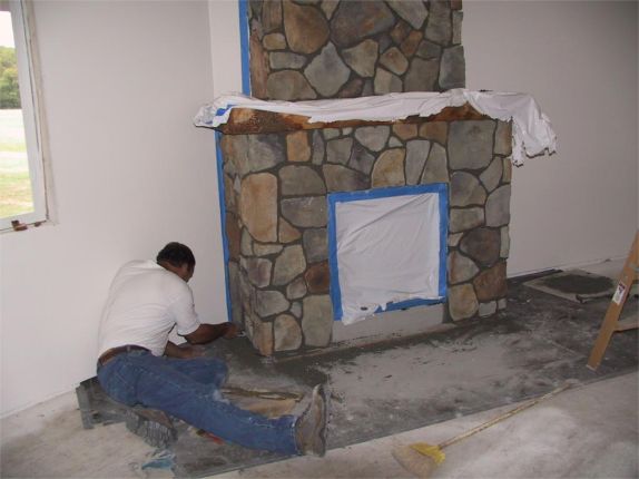 gas fireplace and fake rock