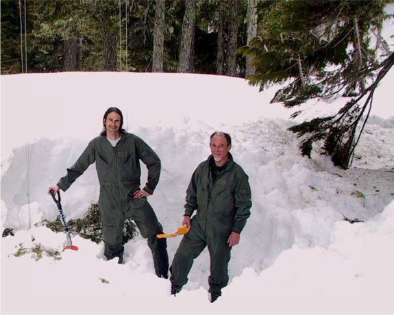 Digging up snow samples at Hoh Lake.